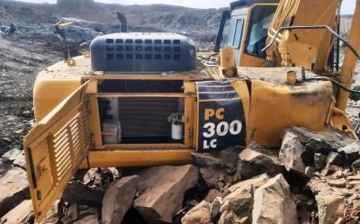 Damaged Komatsu Model PC300 LC-8MO Excavator